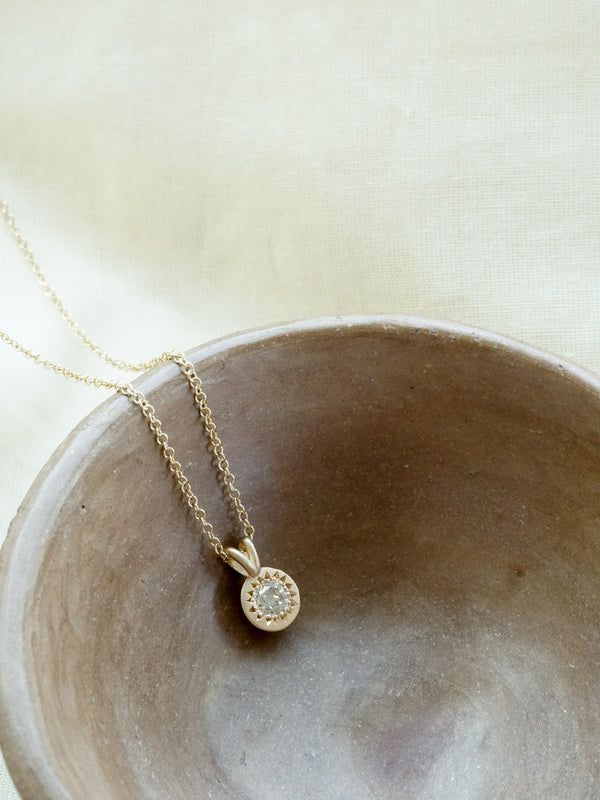 Shown: 14k yellow gold with signature matte finish with our standard Fairmined Cable Chain - 1.2mm.