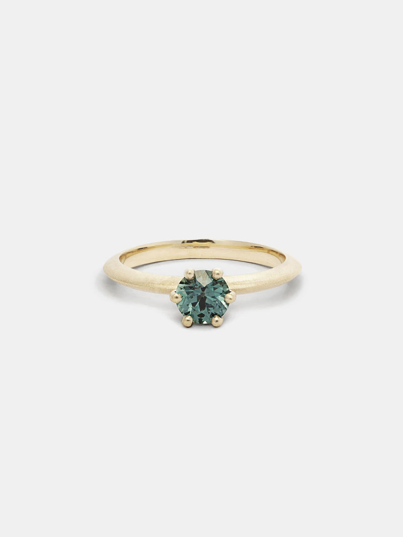 Shown: 0.75ct viridian Montana sapphire in 14k yellow gold with organic texture and signature matte finish. 