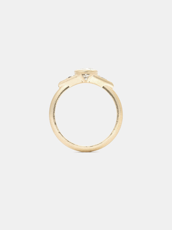 Shown: 0.5ct Faint Color center stone with 2mm sides stones in 14k yellow gold with smooth texture and signature matte finish.