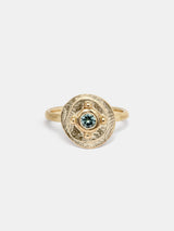 Shown: 0.25ct mint Montana sapphire in 14k yellow gold with organic texture and signature matte finish.