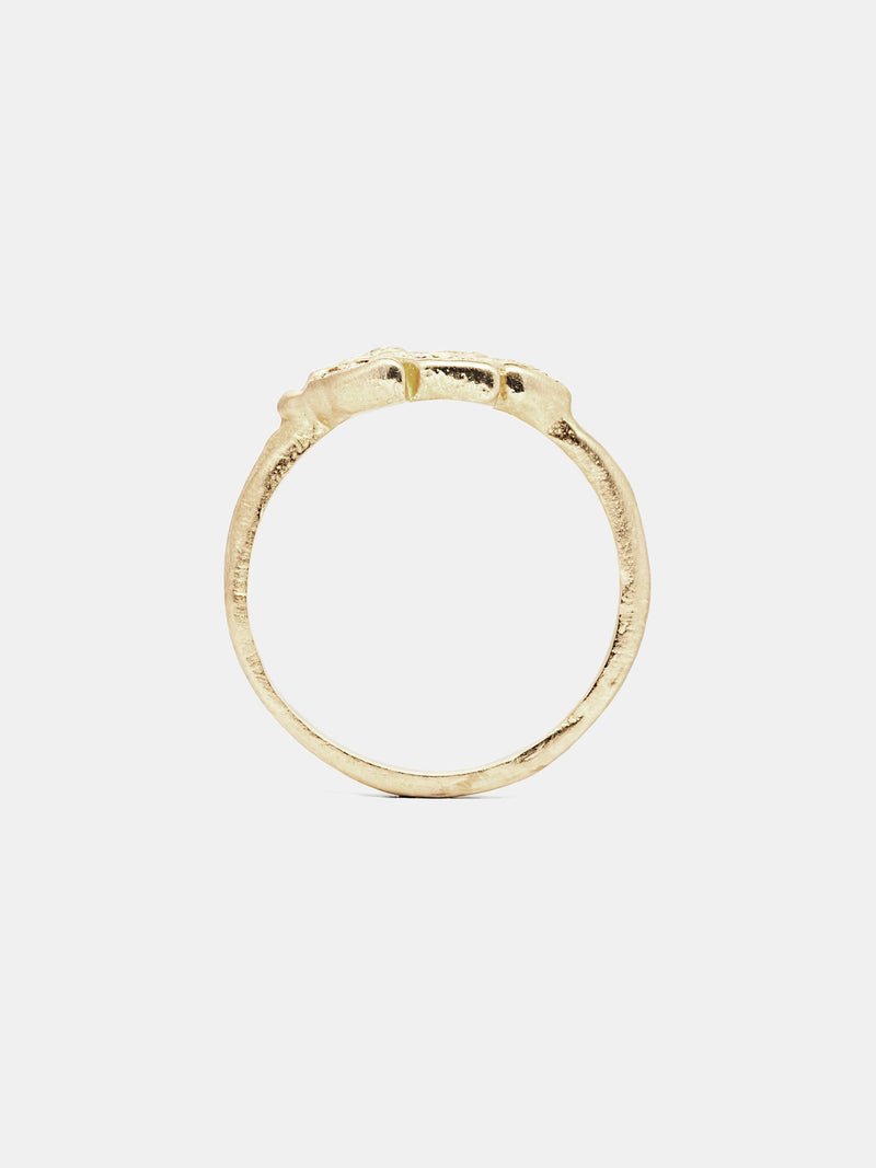 Laure Ring in 14k yellow gold with eight 1.6mm recycled diamonds and organic texture with signature matte finish. 