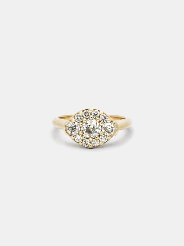 Shown: 0.5ct antique diamond with (2) 3mm antique side stones and recycled diamond accents in 14k yellow gold with smooth texture and signature matte finish.