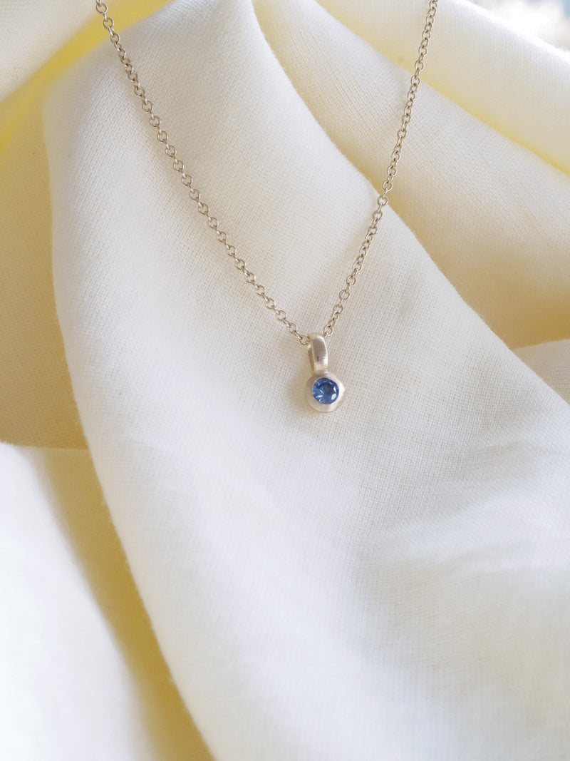 Shown: September — lite blue Montana Sapphire