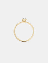 Shown: 0.25ct Near Colorless diamond in 14k yellow gold with diamond pave, smooth texture and signature matte finish.