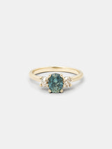 Shown: 1.ct mint oval Montana sapphire with 0.3ct side old European cut diamonds set in 14k yellow gold with smooth texture and signature matte finish. 