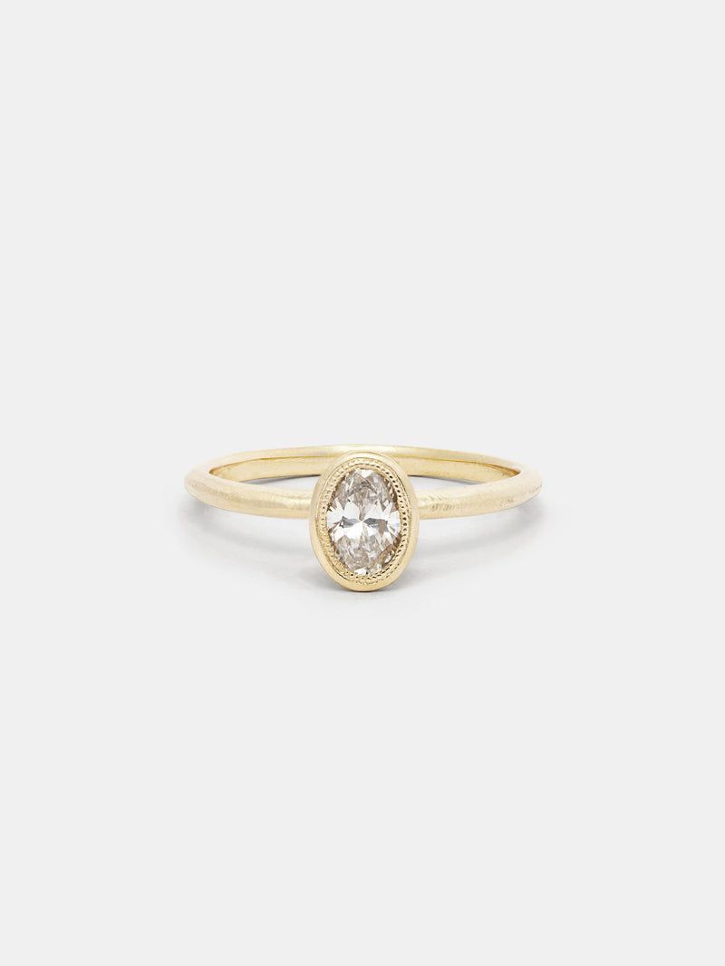 Shown: 0.5ct faint color recycled diamond in 14k yellow gold with organic texture and signature matte finish.