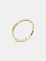 Zinnia Band in 14k yellow gold with organic texture and signature matte finish.